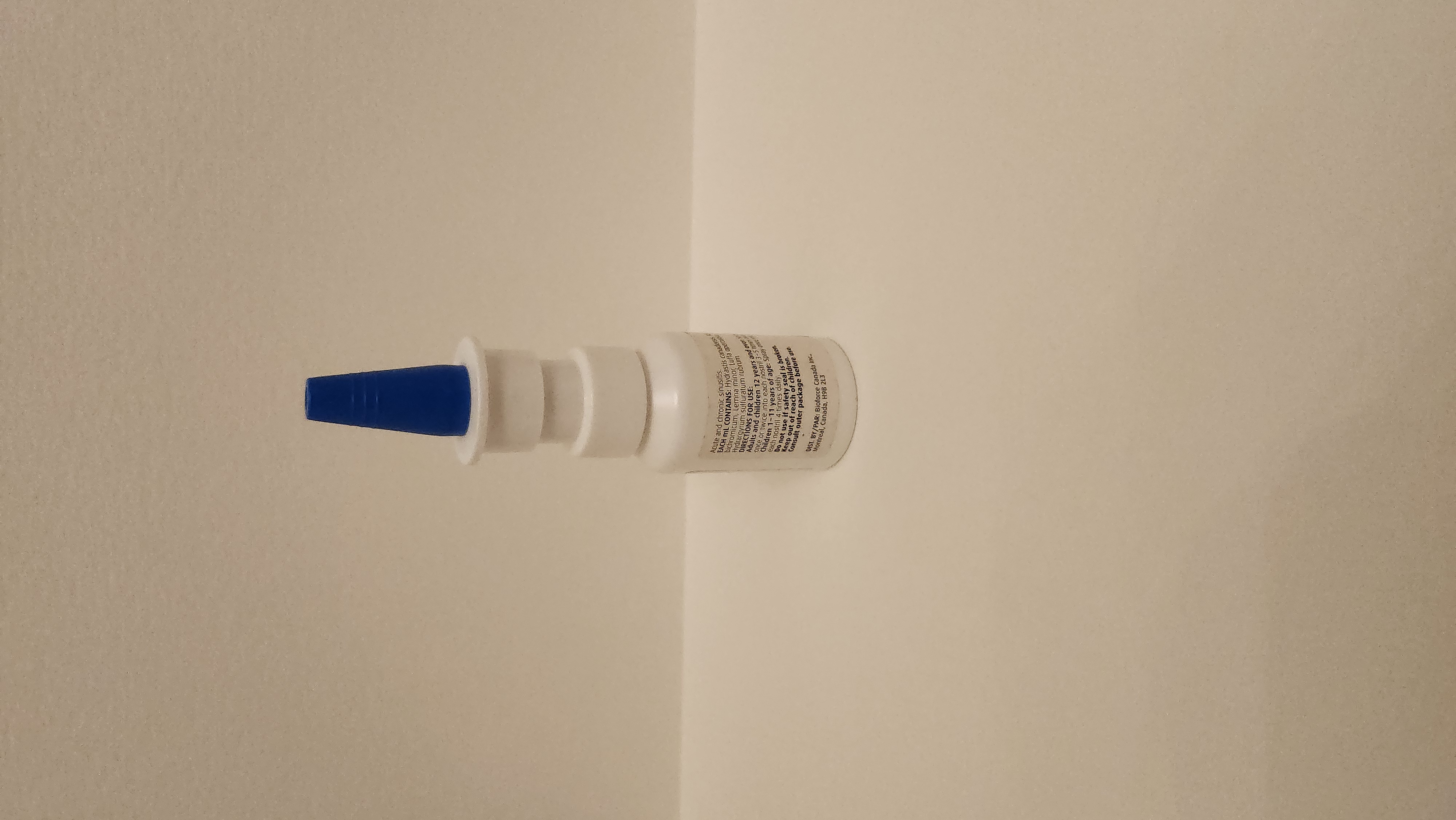 photo of nasal spray bottle, angle 1